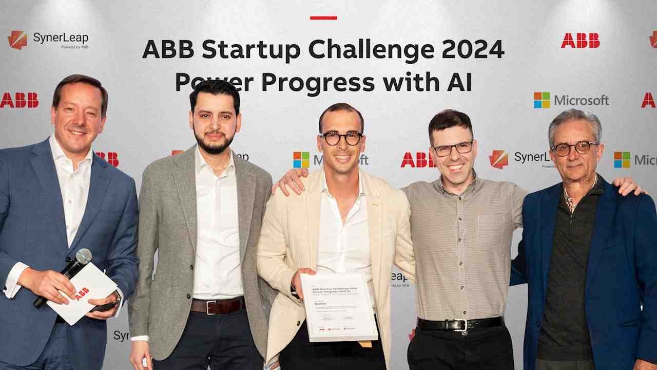 The Enline team receiving a certificate at the ABB Startup Challenge 2024, in front of a backdrop reading "Power Progress with AI"